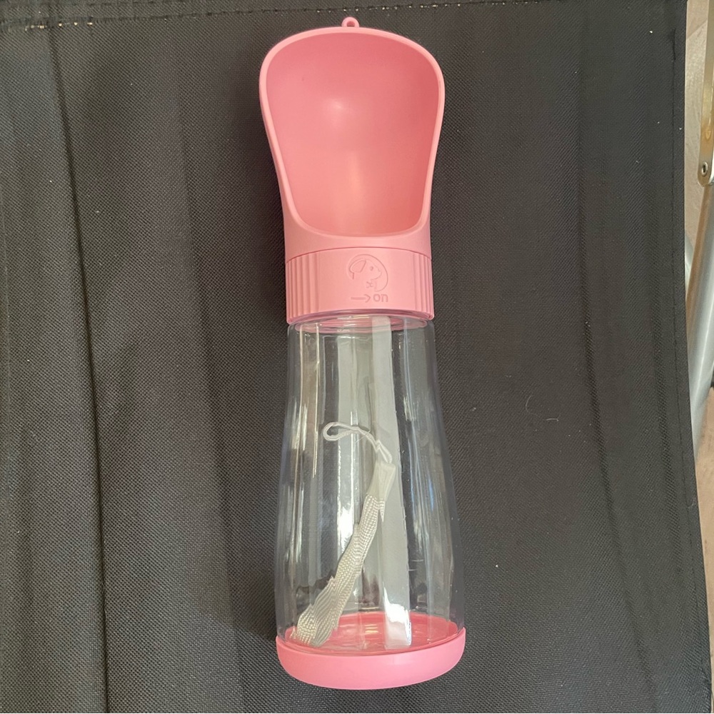 Pink water bottle for pets